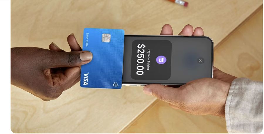 Customer tapping a card to pay with Square